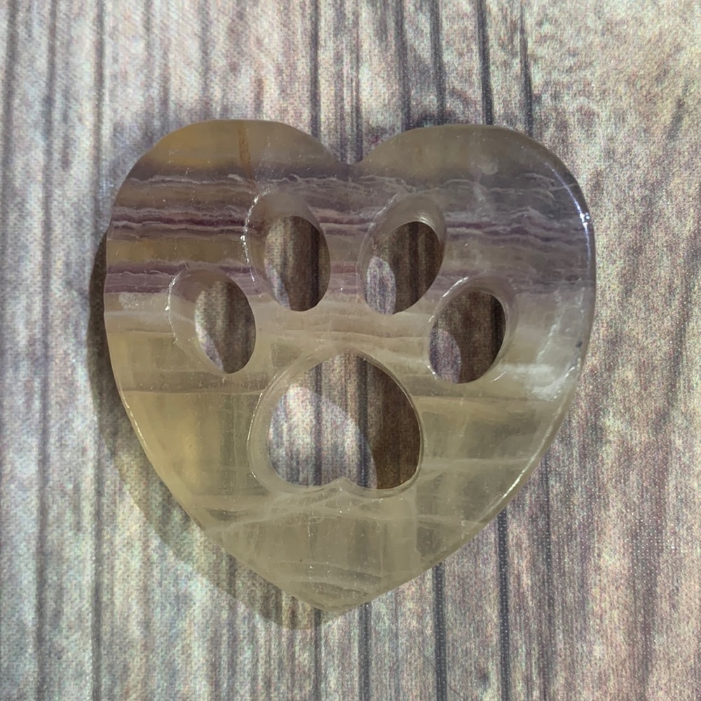 Colorful fluorite paw print carving